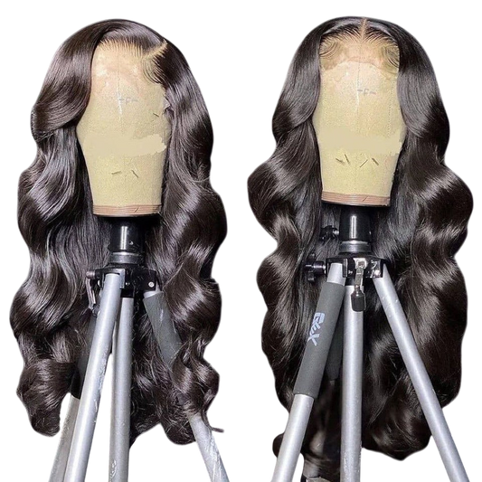 Yoyo Crown long body wave wig with brown highlights on a mannequin head, featuring a middle part and soft waves.