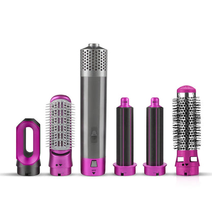 Yoyo Crown 5-in-1 professional hot-air styling brush set with grey handle and interchangeable fuchsia attachments.