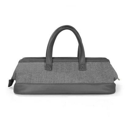 Yoyo Crown grey fabric hair dryer storage bag with sturdy handles and a secure zipper closure for travel protection.