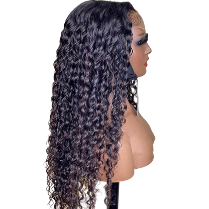 Yoyo Crown long black curly lace front human hair wig on a mannequin head showing a natural hairline and volume.
