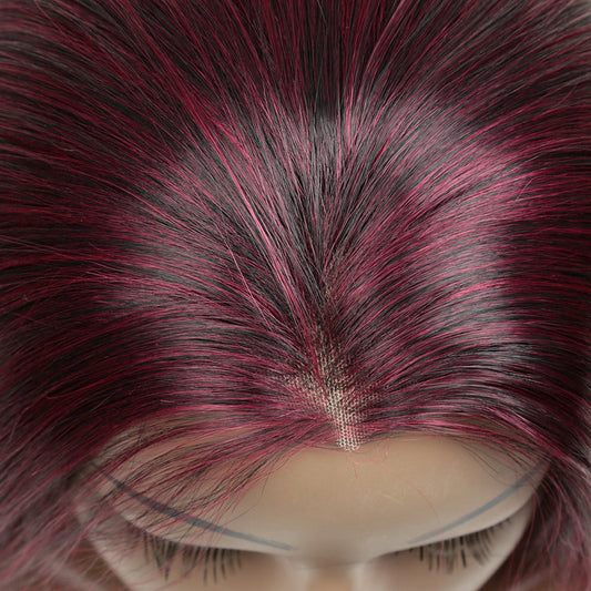 Yoyo Crown Pink Fusion straight lace wig featuring a natural-looking lace part with mixed magenta and black fibers.