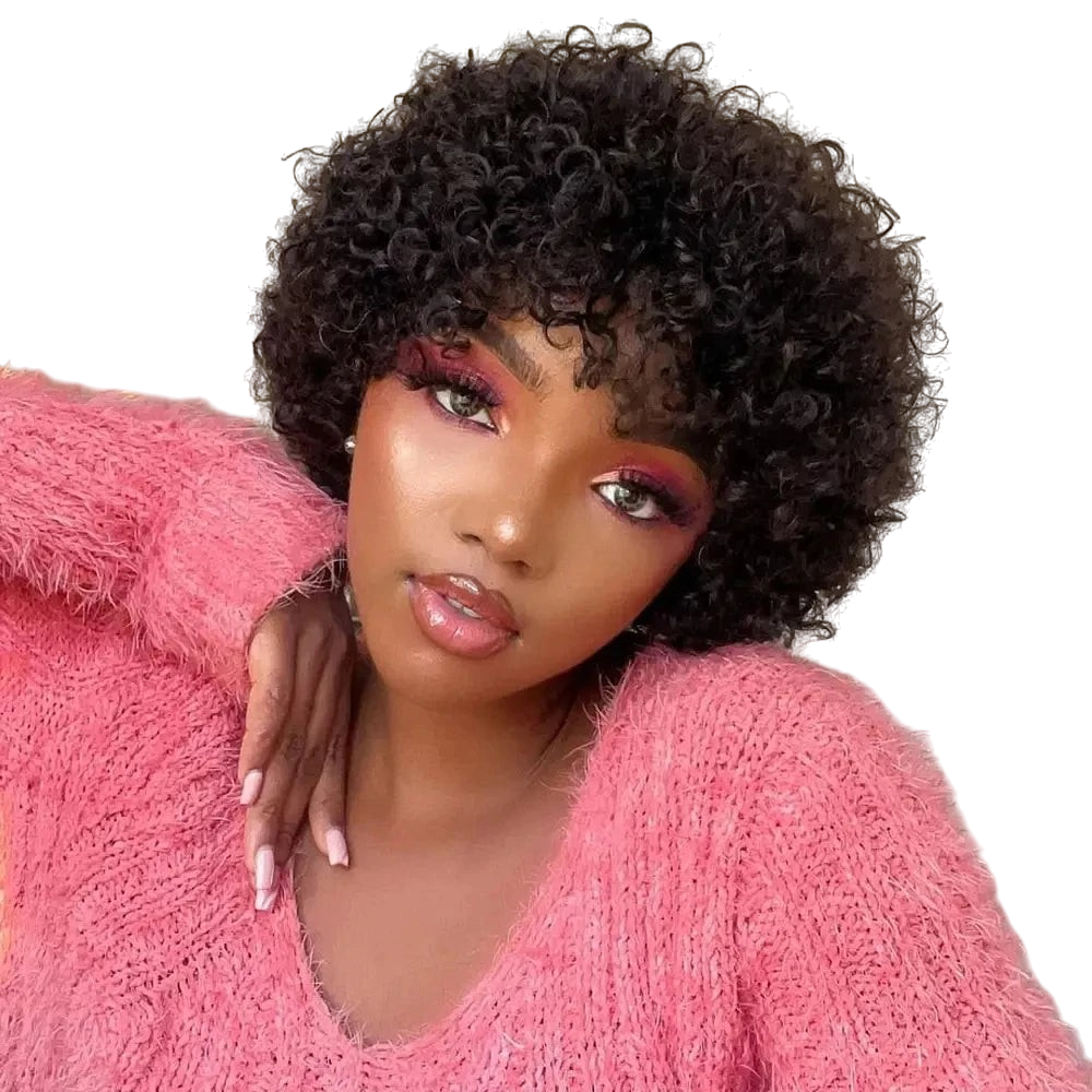 Yoyo Crown short black afro kinky curly wig worn by a model in a pink fuzzy sweater