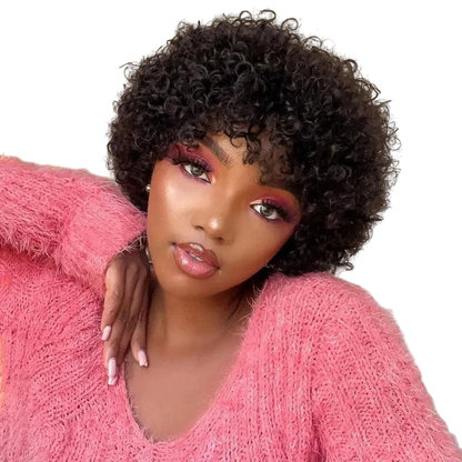 Yoyo Crown short black afro kinky curly wig worn by a model in a pink fuzzy sweater